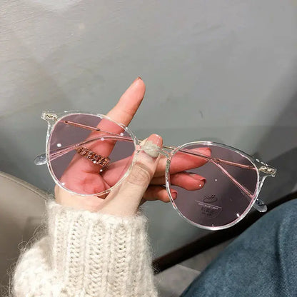 Photochromic Anti-Blue Light Glasses | UV400 Sun-Reactive Sunglasses – Transparent White Round Frame | Kabayan Bazaar UAE