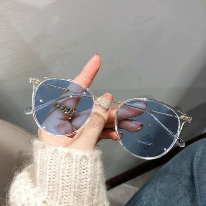 Photochromic Anti-Blue Light Glasses | UV400 Sun-Reactive Sunglasses – Transparent White Round Frame | Kabayan Bazaar UAE