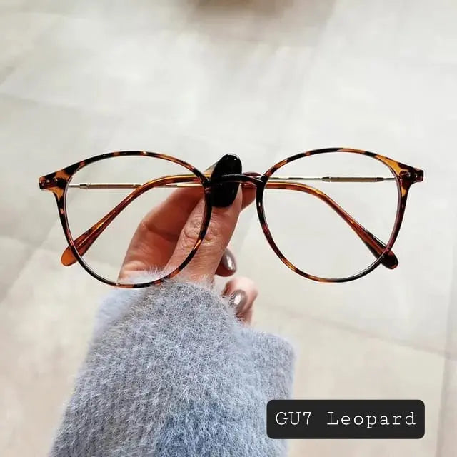 Photochromic Anti-Blue Light Glasses | UV400 Sun-Reactive Sunglasses – Transparent White Round Frame | Kabayan Bazaar UAE